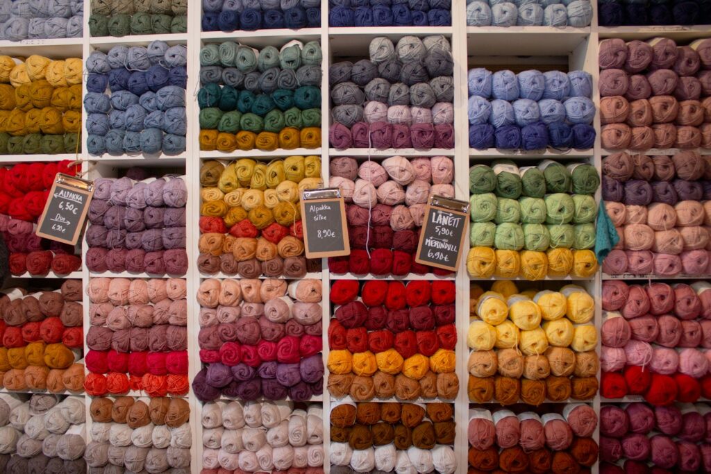 Assorted colourful balls of yarn, ready for knitting and crochet wool projects